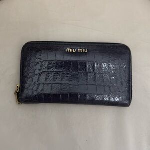 Miu Miu Long Zipped Wallet
Croc embossed leather
